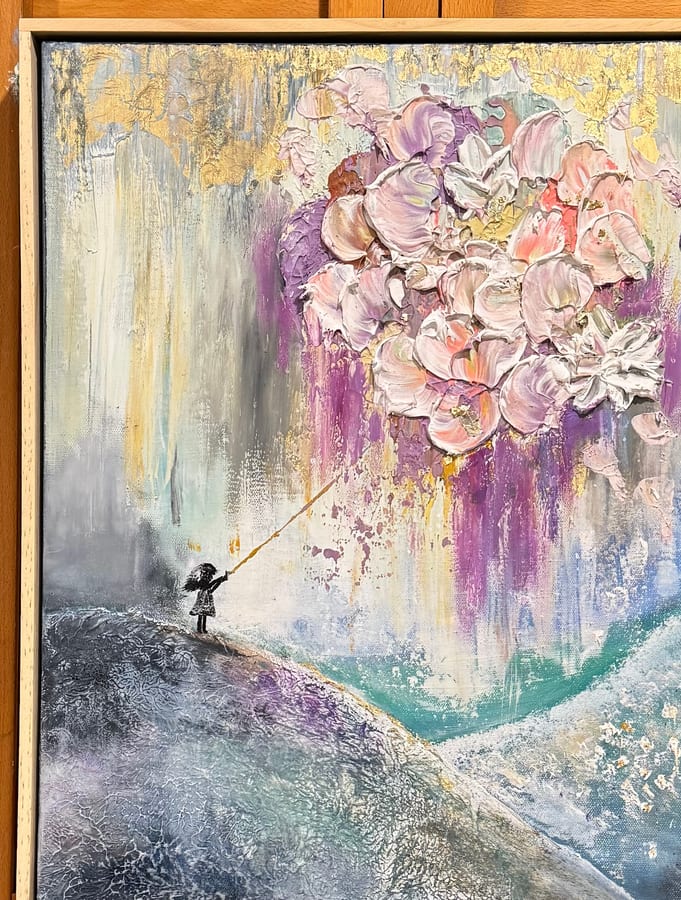 A small figure on a hillside holding a golden thread to an enormous floating bouquet.